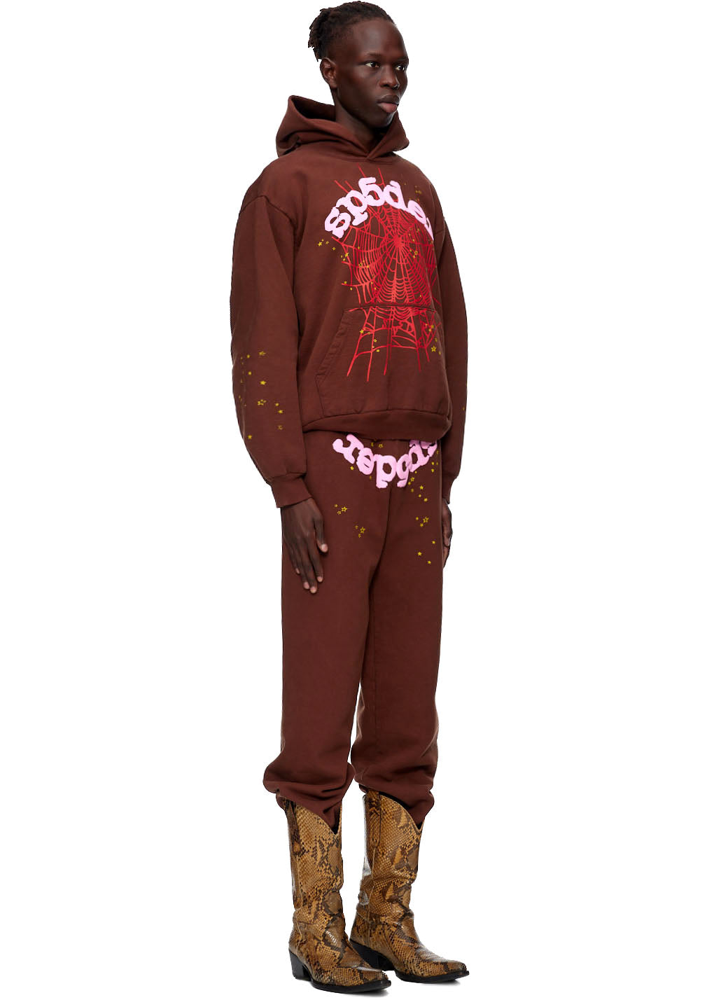 Brown 23oz fleece hoodie and sweatpants with pink SP5DER web and logo prints, gold star details.