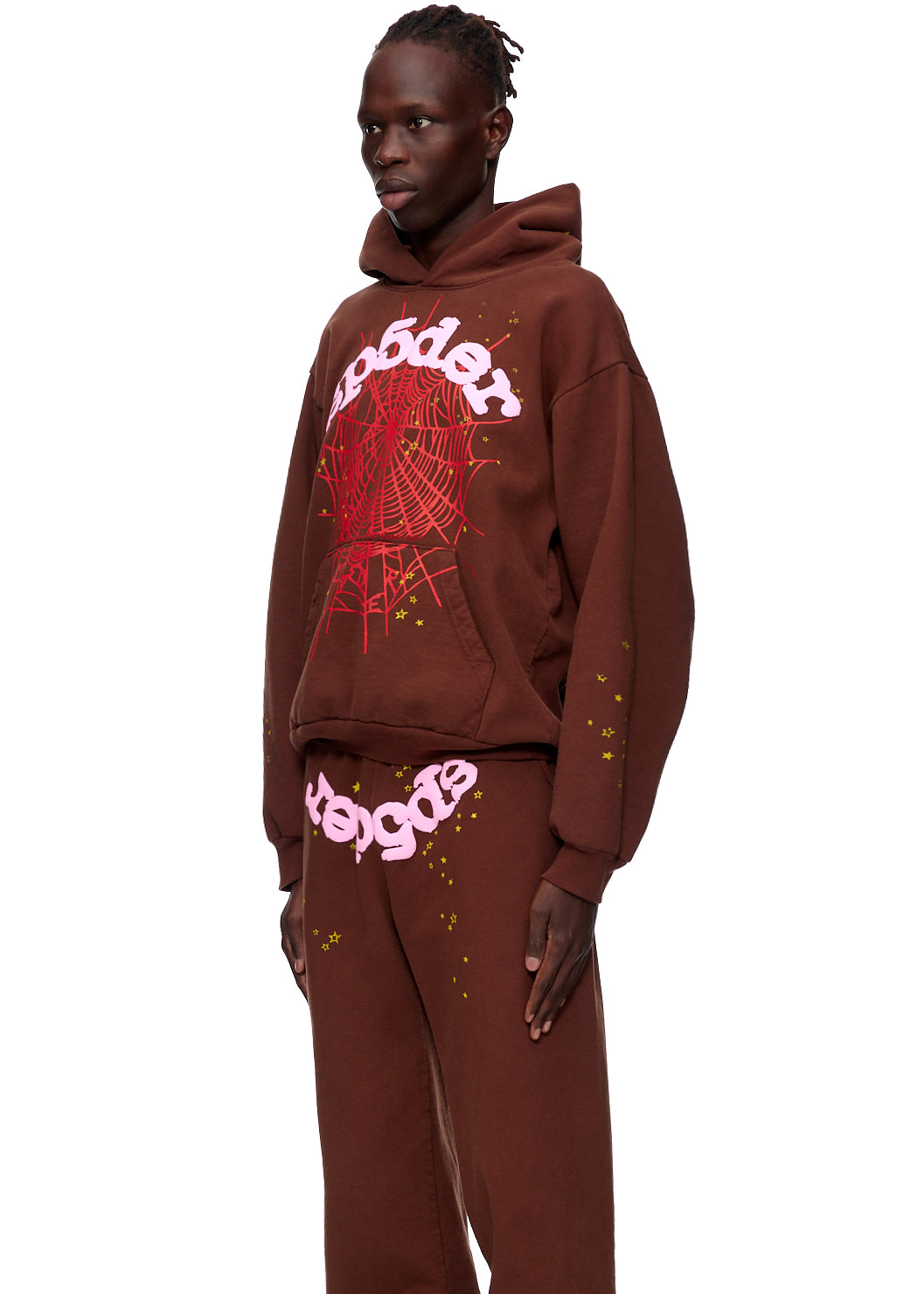 Brown 23oz fleece hoodie and sweatpants with pink "SP5DER" text and red web puff print.