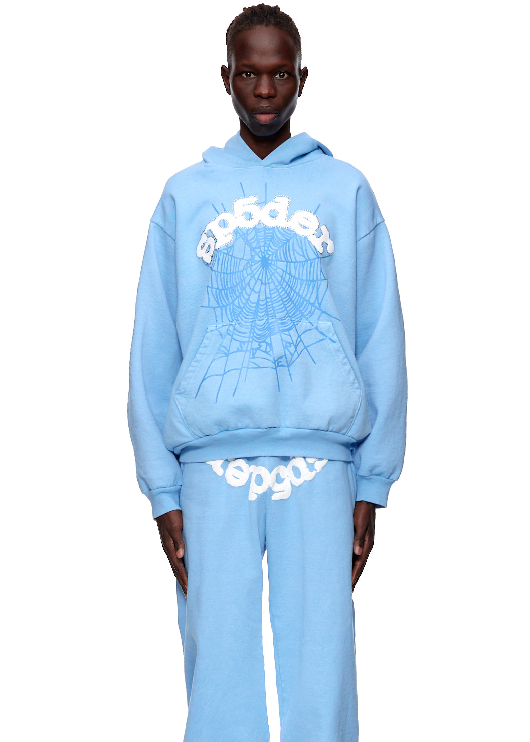 Light blue fleece hoodie with white SP5DER web and logo prints, worn by a model.