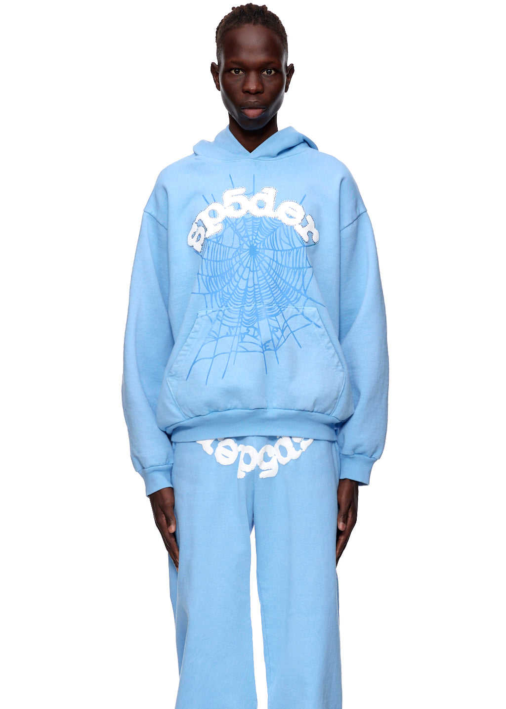 Light blue fleece hoodie with white SP5DER web and logo prints, worn by a model.