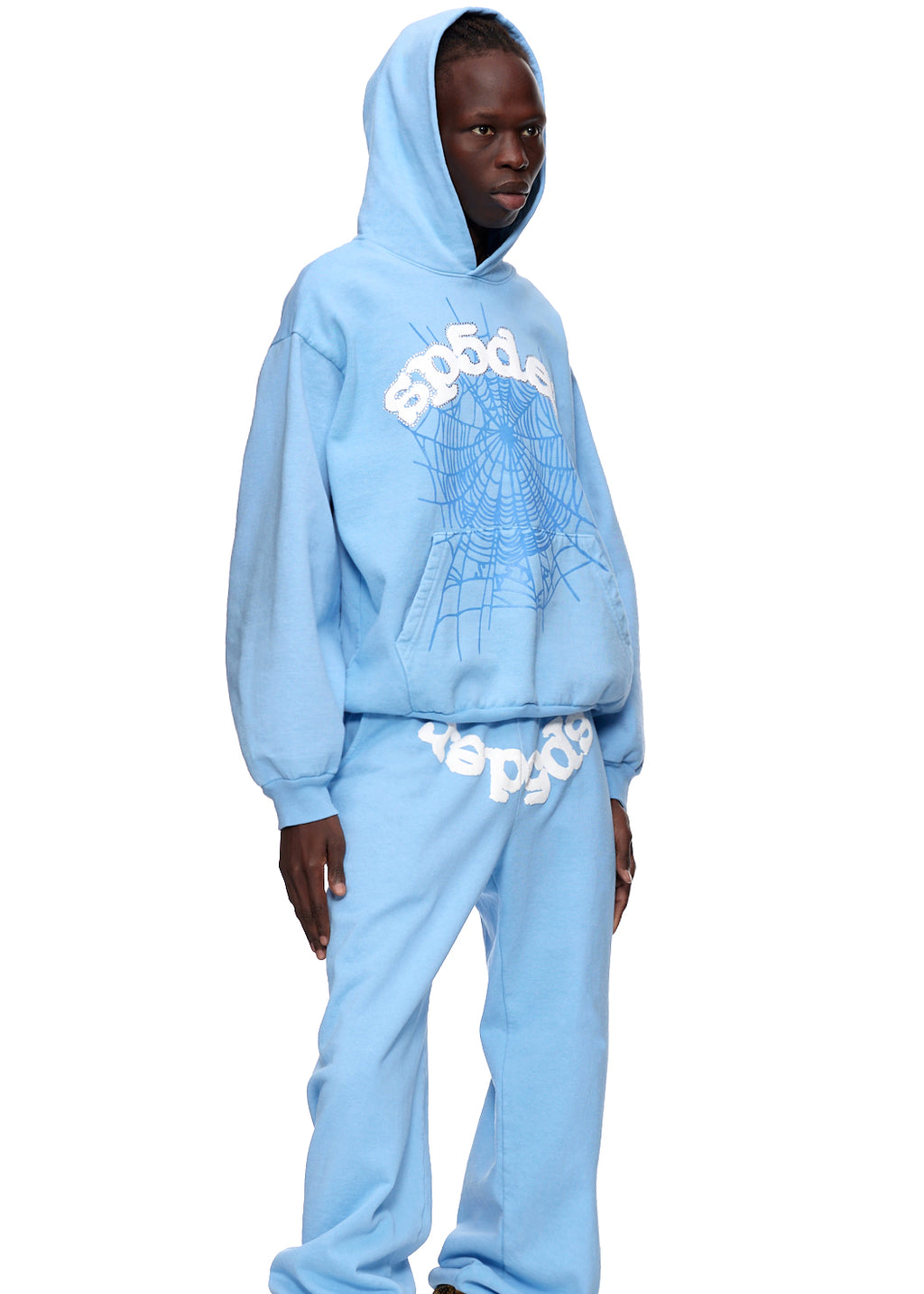 Light blue WEB HOODIE and sweatpants with white puff print "SP5DER" and blue web graphic.