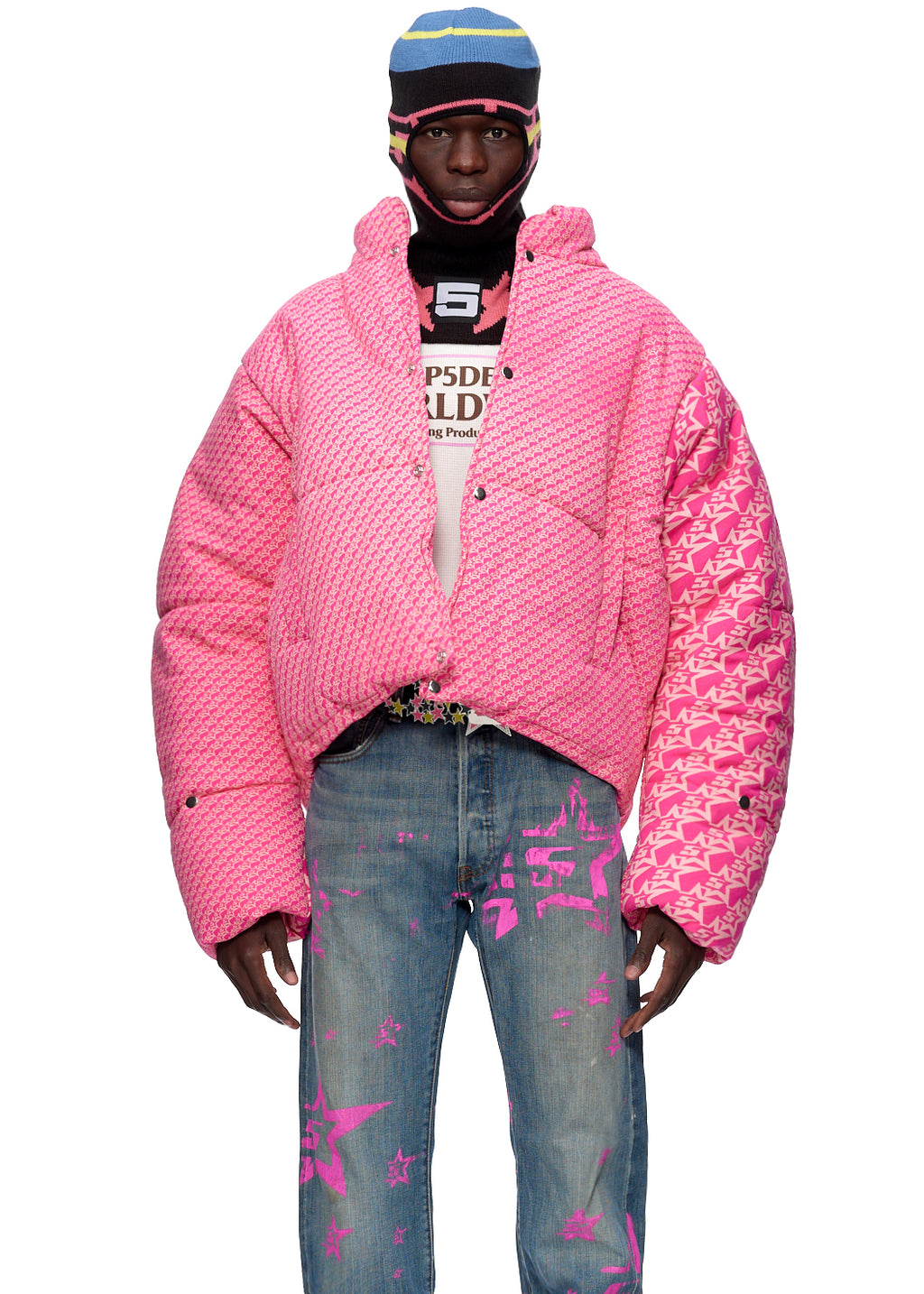 Pink 5STAR P*NK PUFFER JACKET with all-over hand-printed "5 Star" design, worn by a model.