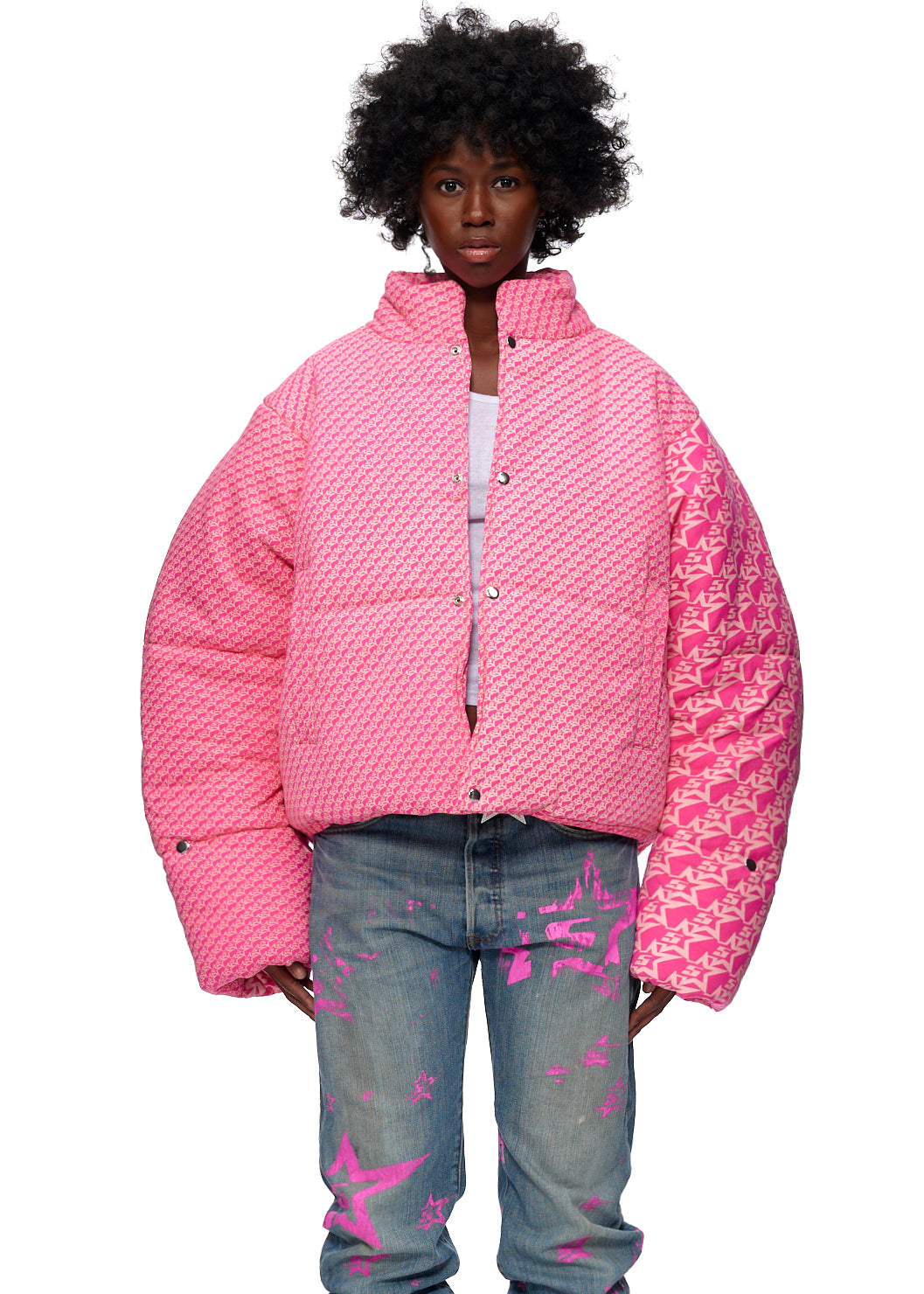 Pink 5STAR P*NK PUFFER JACKET with all-over "5 Star" print, worn by a model.