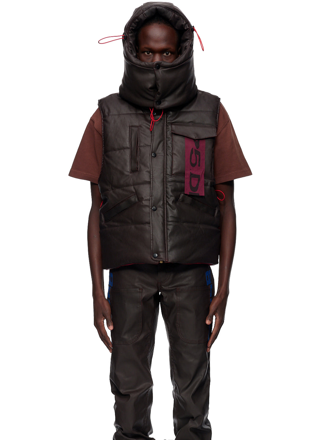 Brown coated canvas hooded puffer vest with antique brass zipper and branded SP5DER label.