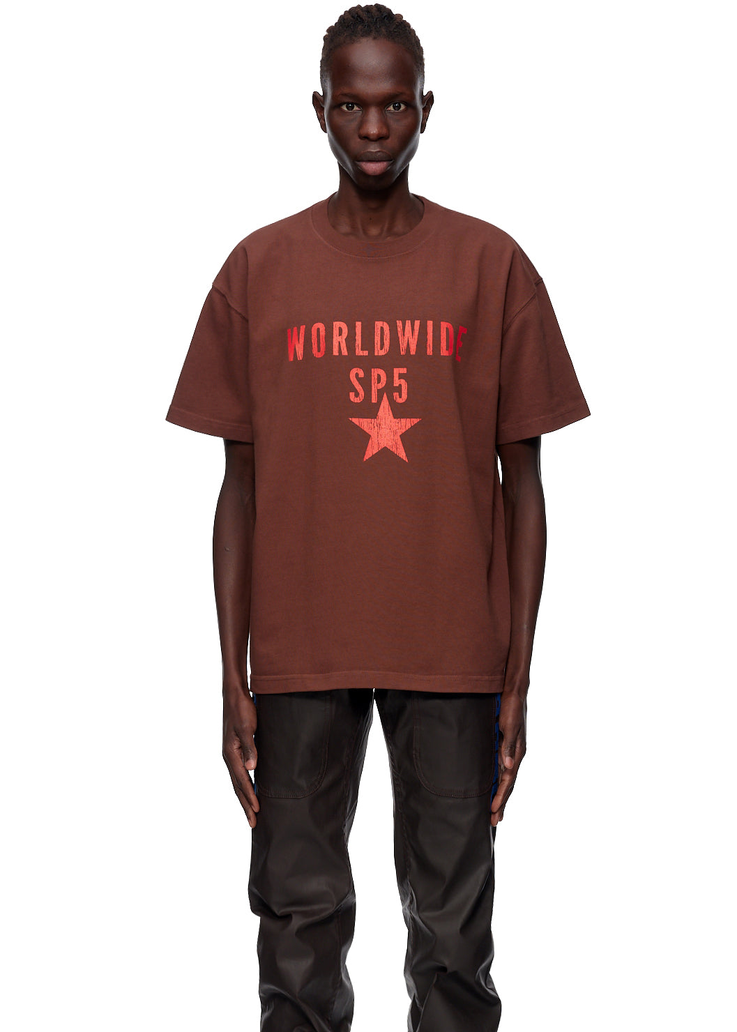 Brown oversized cotton jersey tee with "WORLDWIDE SP5" and red star graphic.