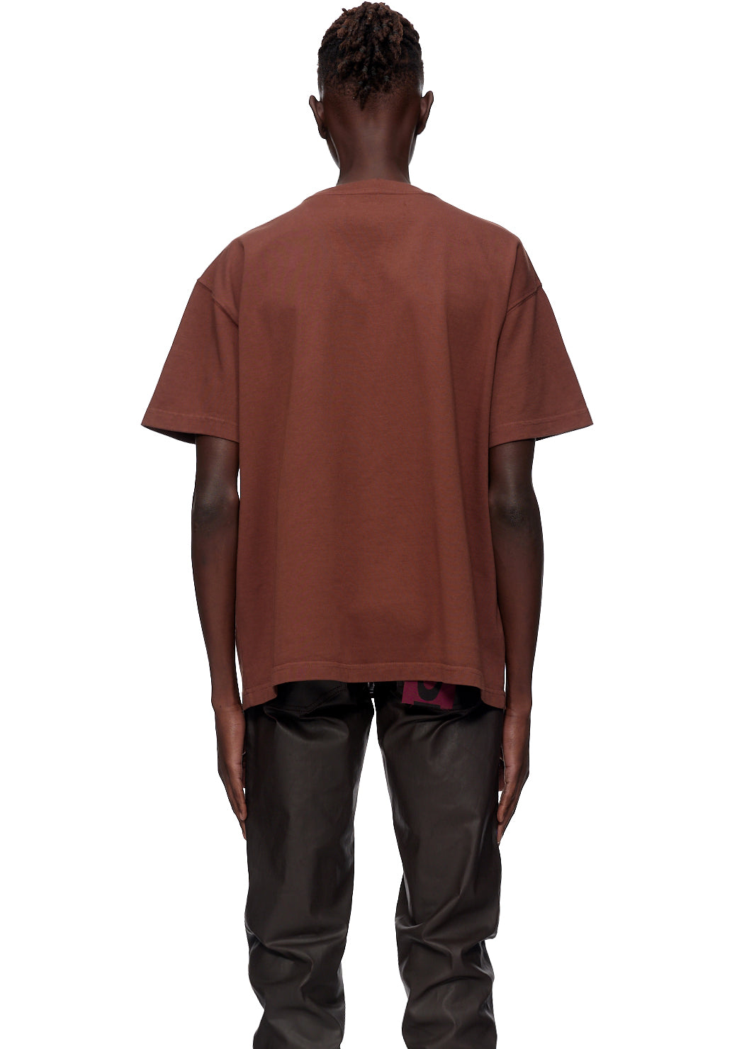 Back view of a person wearing an oversized brown 12oz combed cotton jersey tee.
