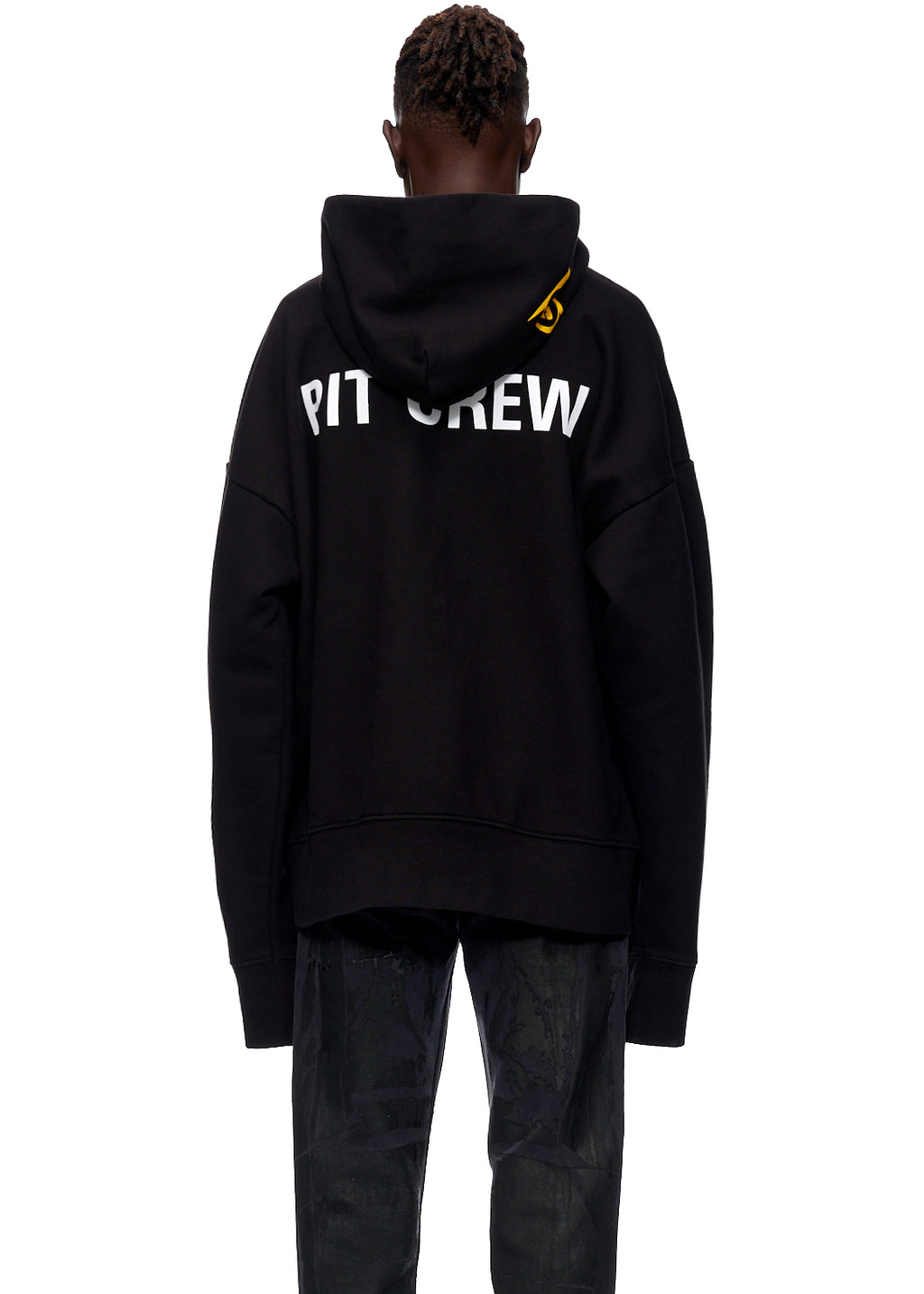 Black oversized Pit Crew hoodie, 23oz French Terry, with white "PIT CREW" graphic on back and yellow hood graphic.