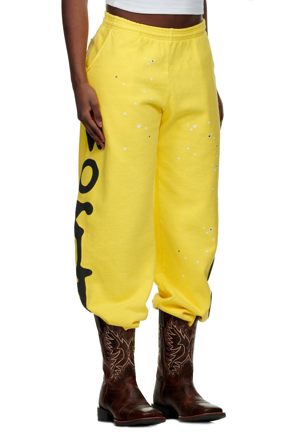 Yellow BELUGA SWEATPANT with black 'Worldwide' puff print, white stars, and discharge print.