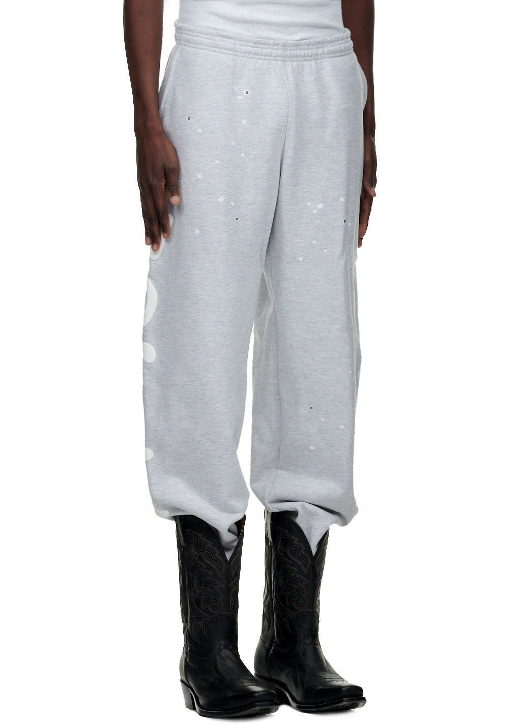 Light grey BELUGA SWEATPANT with white puff print and discharge print, featuring 'Worldwide' text and stars.