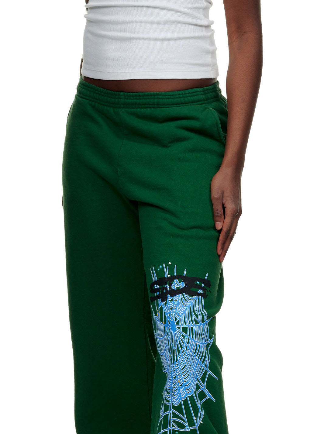 Green 23oz fleece sweatpants with SP5DER text and blue web puff print on the left leg.