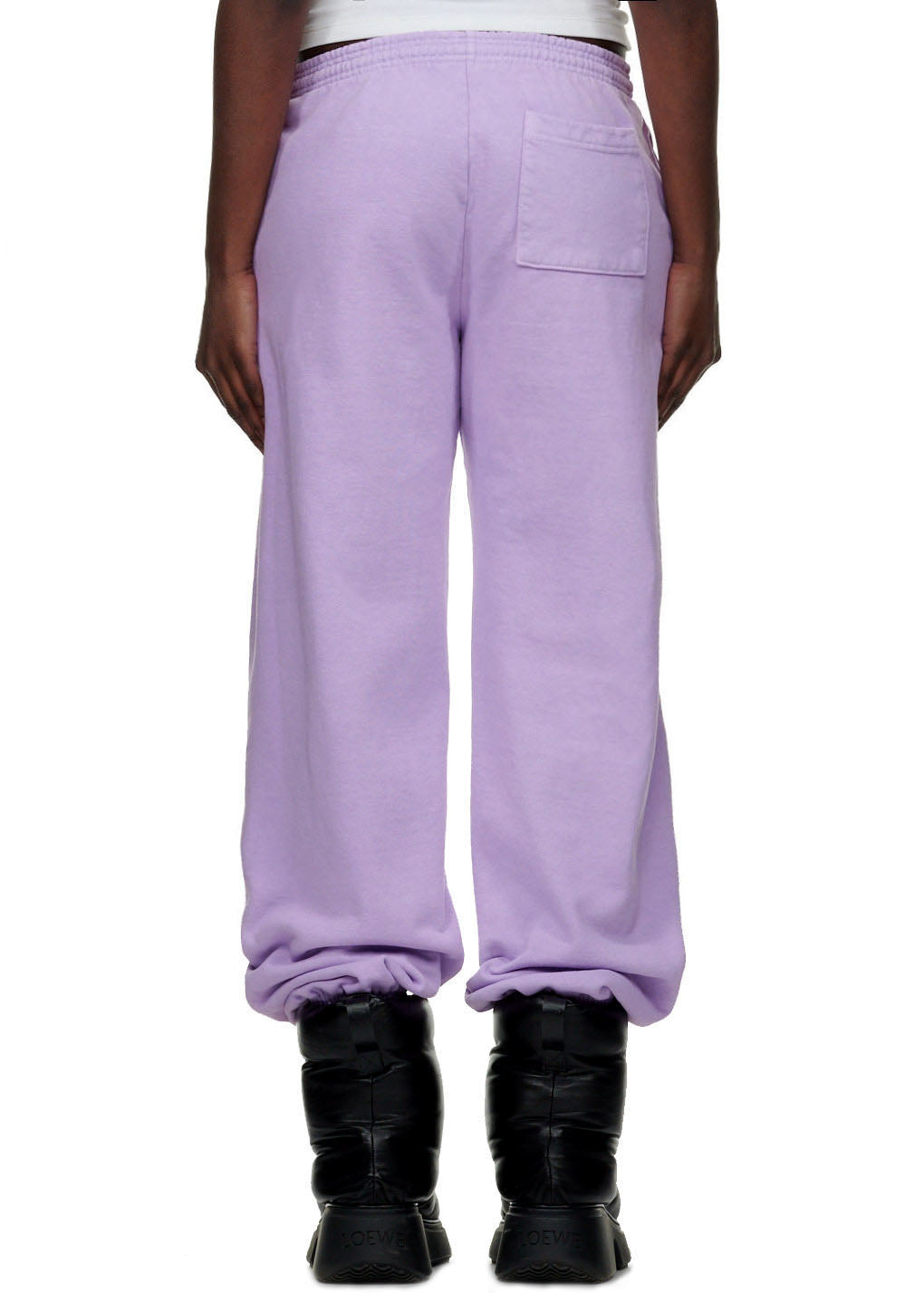 AÇAÍ SP5DER SWEATPANT, light purple 23oz fleece sweatpants with a back pocket, worn by a model.