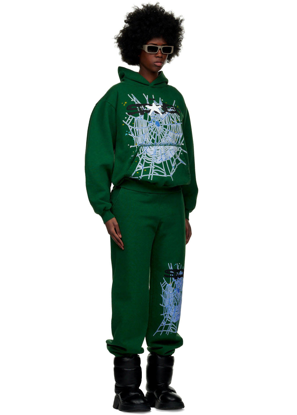 Green 23oz fleece sweatpant with SP5DER text and web puff/discharge print on left leg.