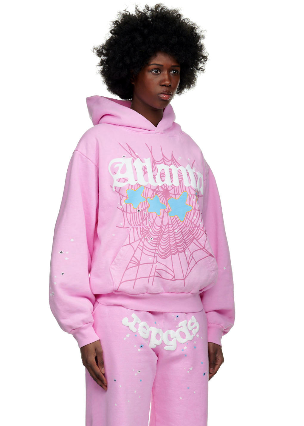 Pink Atlanta Hoodie with white puff print, blue stars, and spiderweb design.