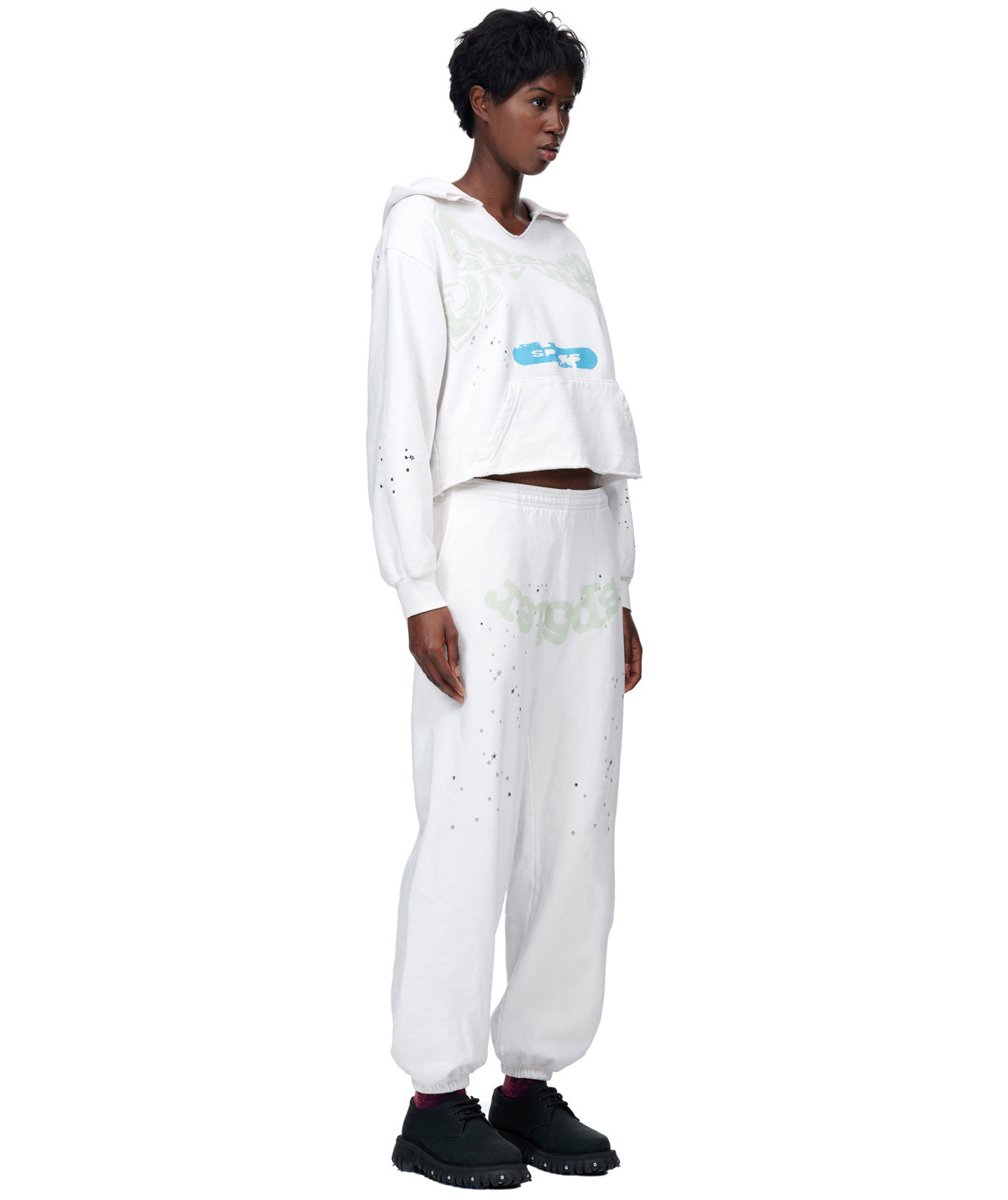 White cropped hoodie and sweatpants set with puff print, discharge print, and custom racing patch.