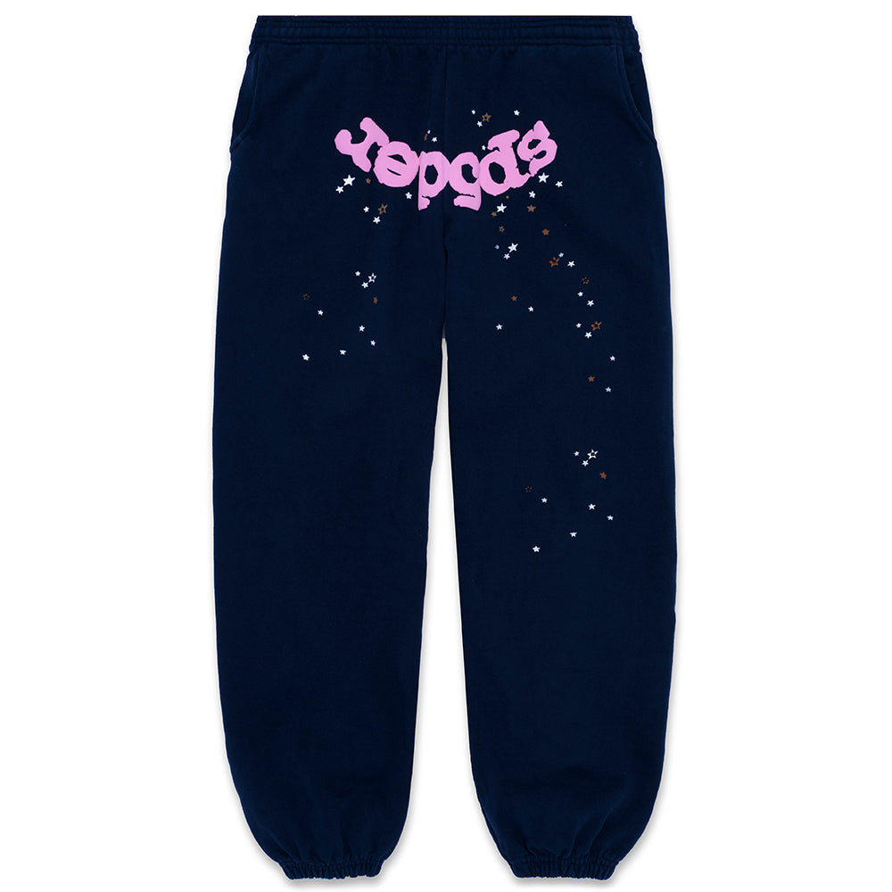 Navy blue fleece sweatpants with pink puff print "Sp5der" and scattered star graphics.