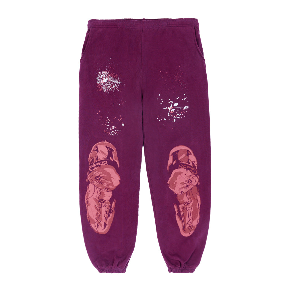 Purple 23oz fleece sweatpants with white spiderweb, splatter, and pink puff print graphics.