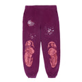 Purple 23oz fleece sweatpants with white spiderweb, splatter, and pink puff print graphics.