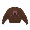 Oversized brown French terry crewneck with a glowing purple graphic of a figure with hands clasped.